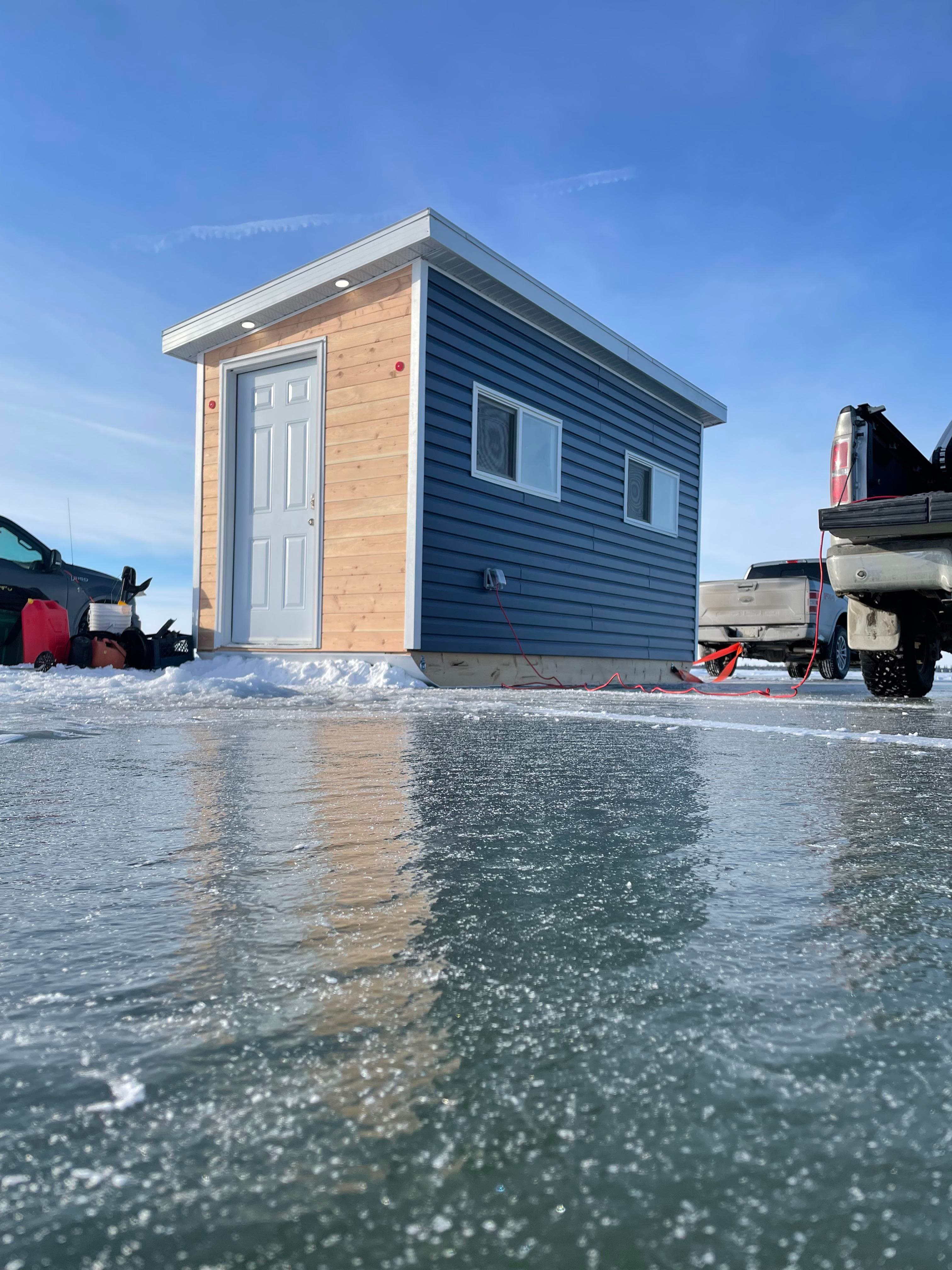 The cozy, heated interior of the Smalz ice fishing shack.