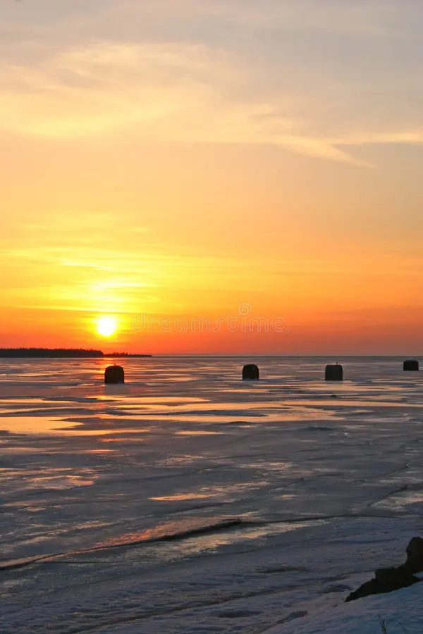 Beautiful sunrise over the frozen landscape of Lake Simcoe.